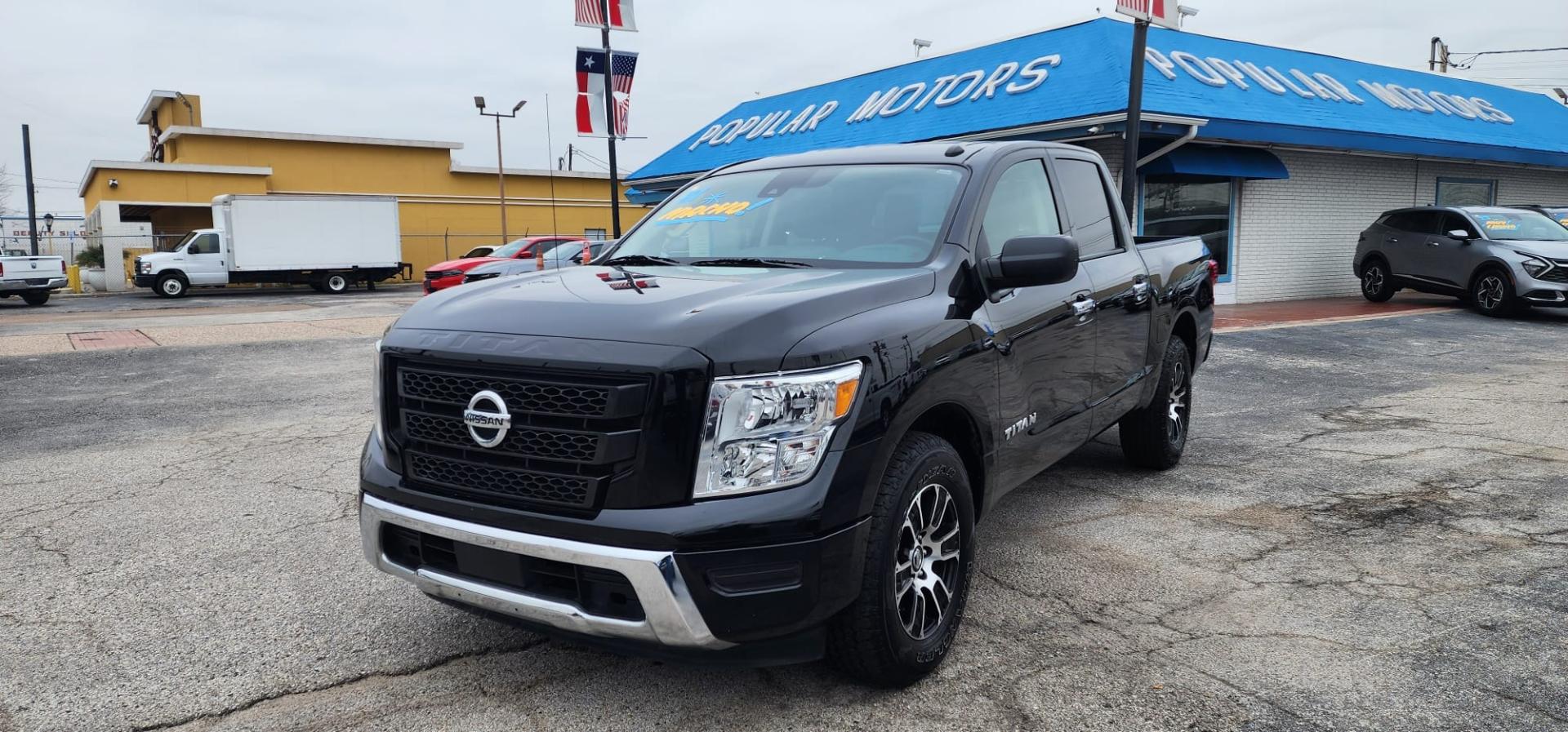 2021 Black Nissan Titan S Crew Cab 2WD (1N6AA1EEXMN) with an 5.6L V8 DOHC 32V engine, 9A transmission, located at 1842 Wirt Road, Houston, TX, 77055, (713) 973-3903, 29.805330, -95.484787 - Photo#0